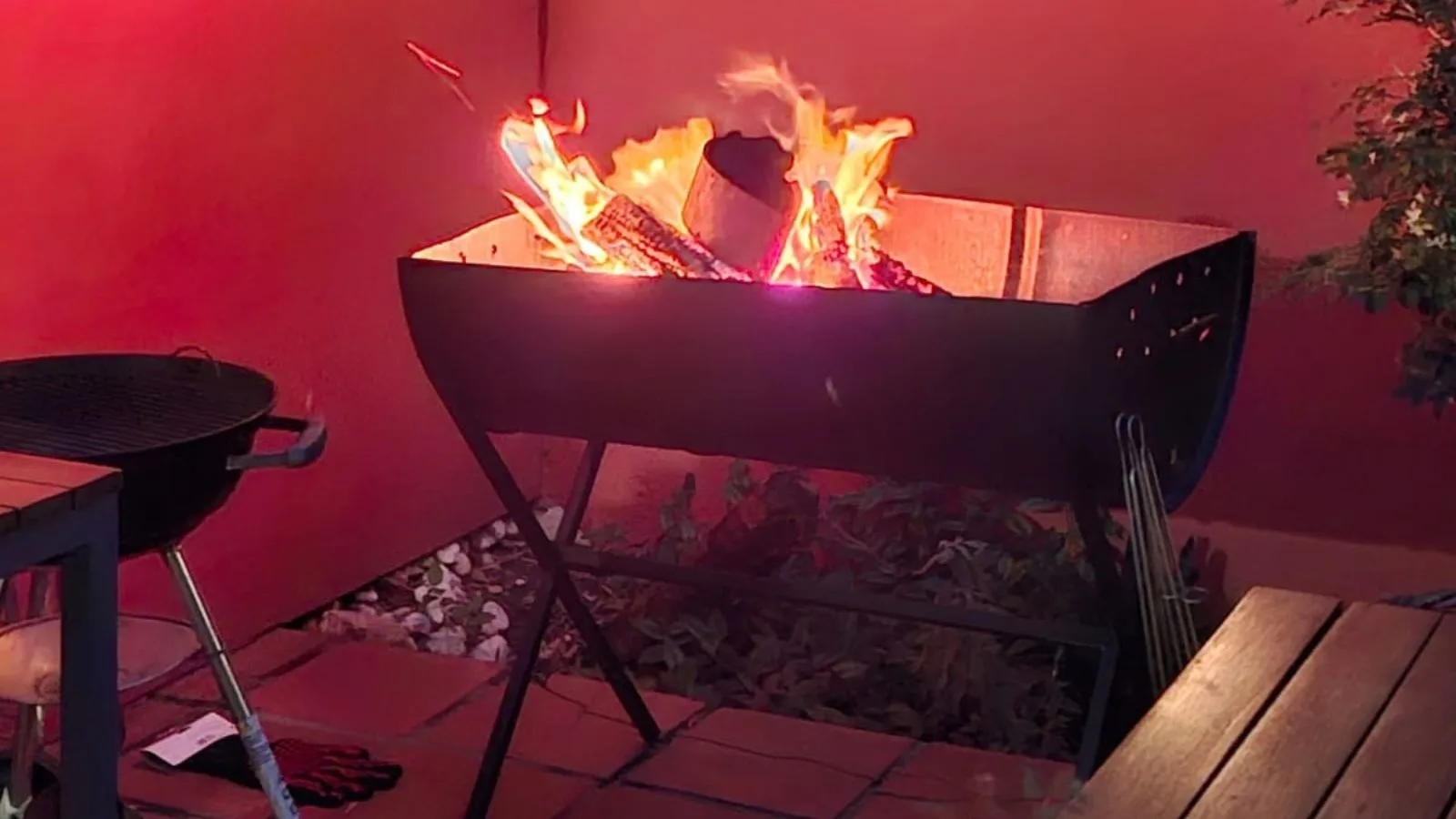Traditional South African braai with meat cooking over hot coals